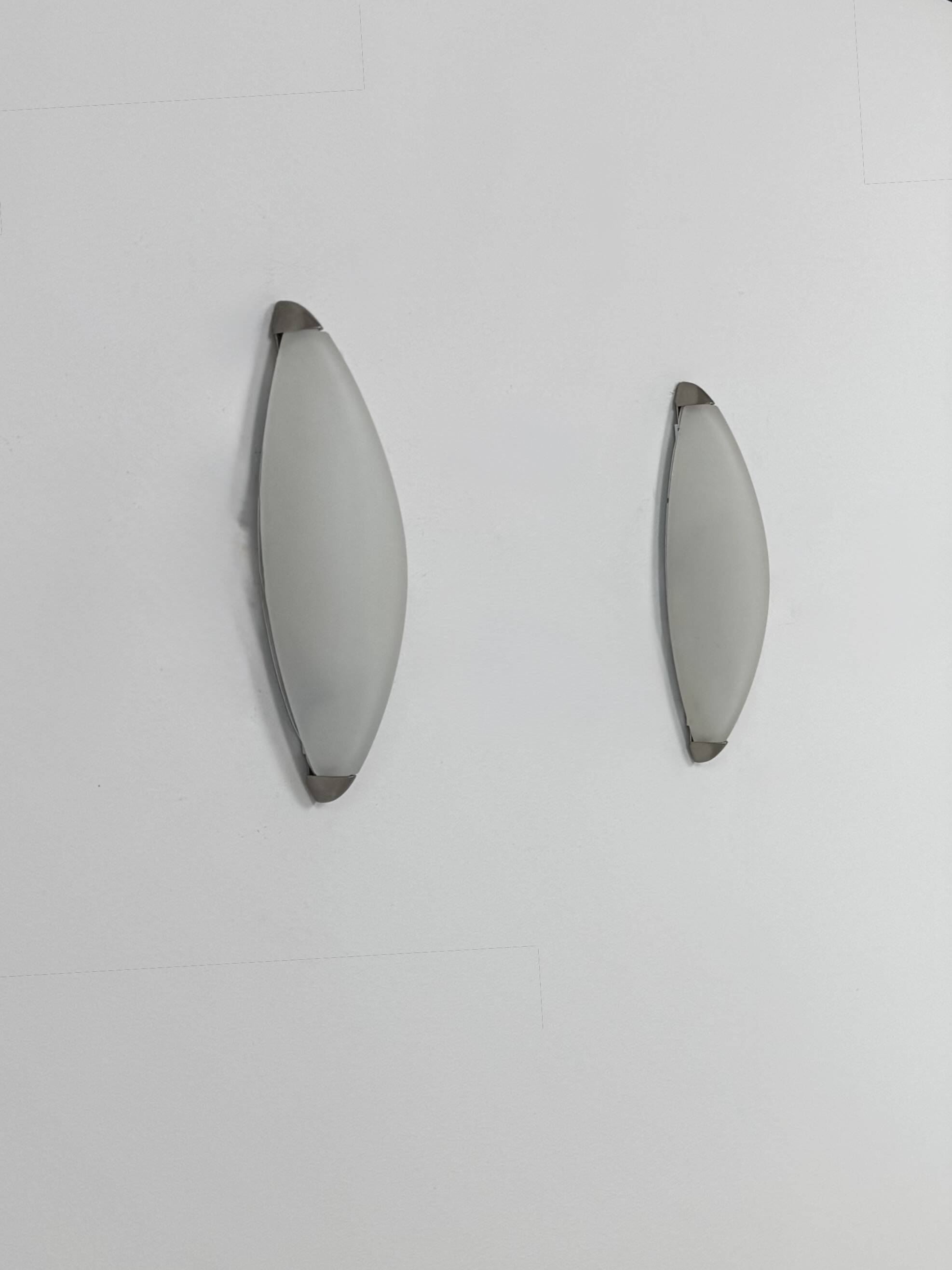 Vintage wall lights, chrome metal and frosted glass, France, 1970.