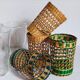 Four long drink glasses in vintage woven rattan cases