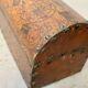 Old wooden and studded leather box