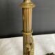 Pair of 19th-century gilded bronze candlesticks in Empire style.