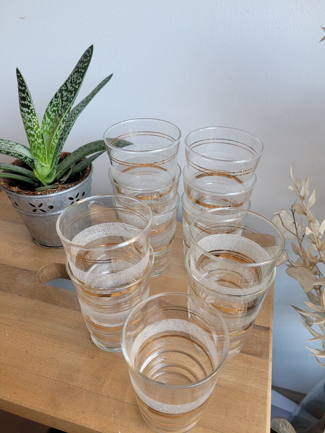 Set of 11 granite glass cups and golden edging