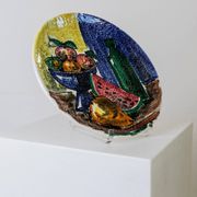 Multicolored hand-painted ceramic wall plate with 1960s Italian fruit motif, signed Stile