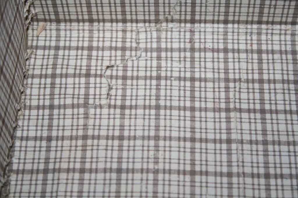 Small suitcase cardboard orange