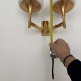 Golden metal wall light and opaline, 1970