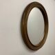 Antique round oak mirror