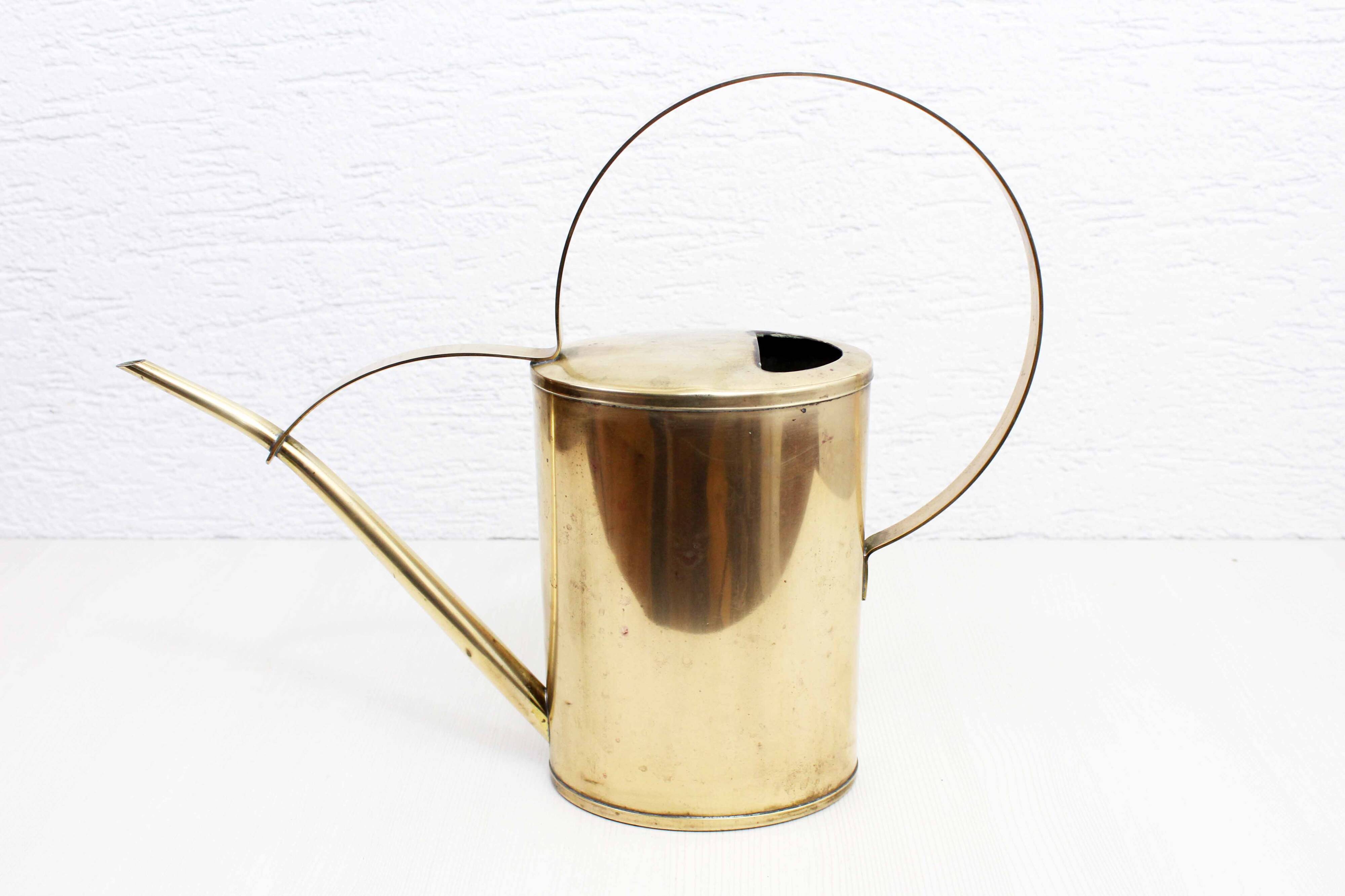 Vintage brass watering can