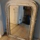 Antique mirror with carved wooden frame
