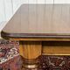 Victorian-style mahogany English table with 3 extensions.