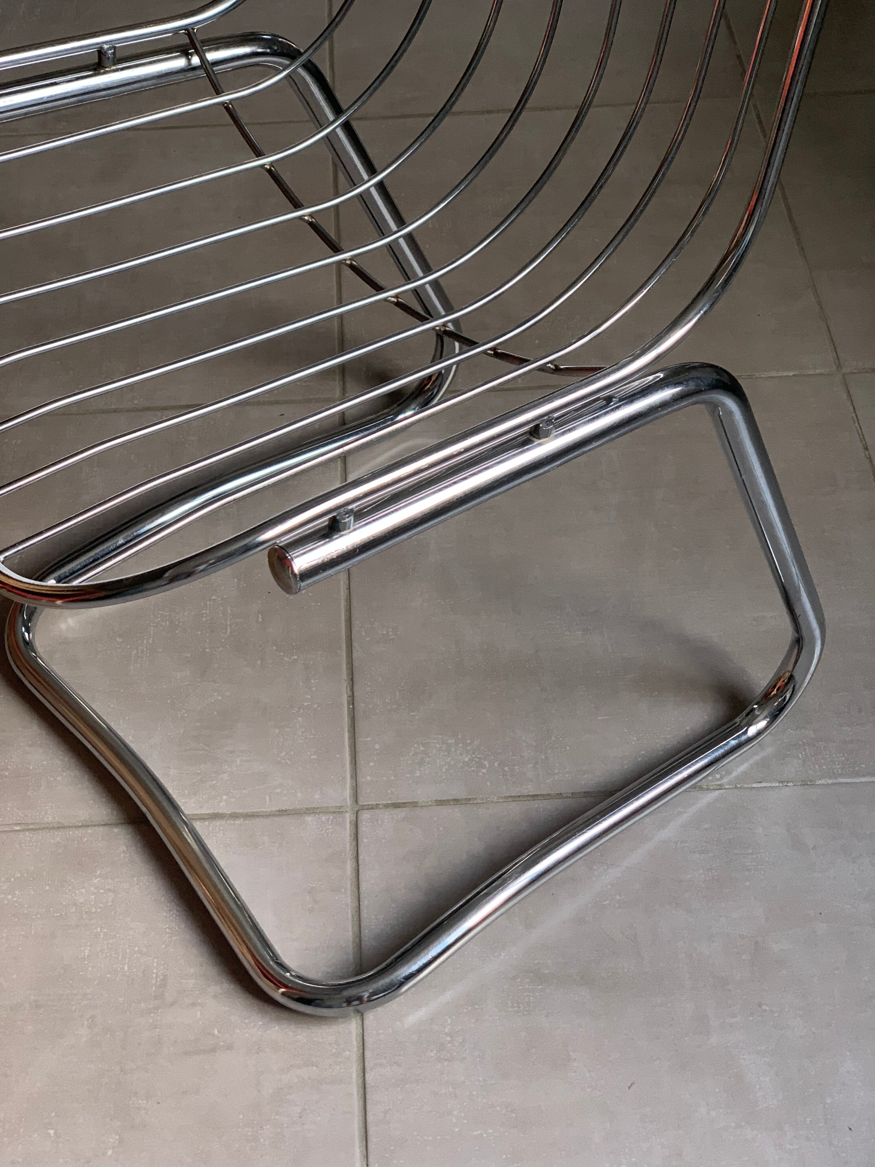 Design chair 70' in chrome metal