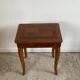 Small marquetry pedestal table with key storage