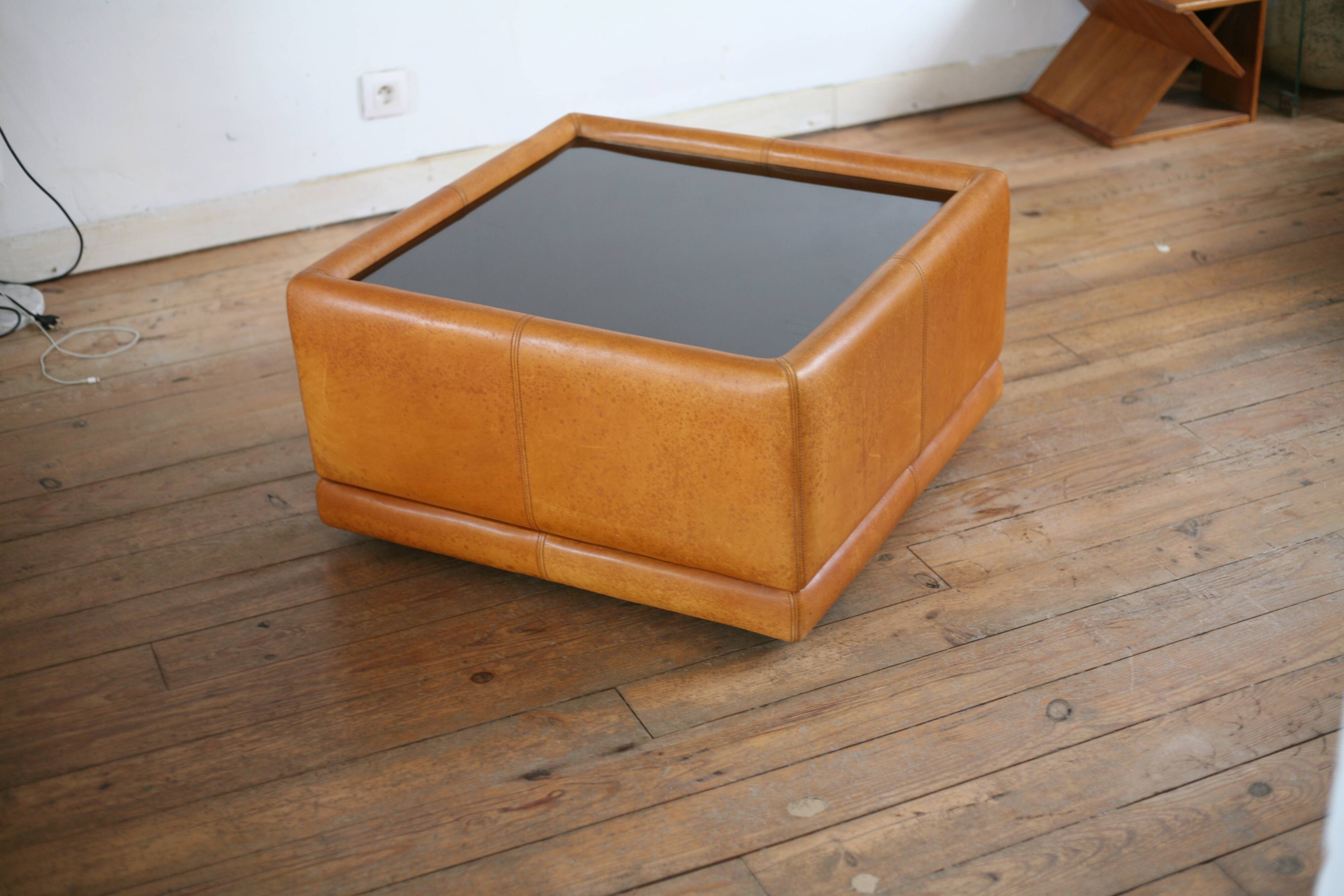 black leather and glass coffee table, vintage design