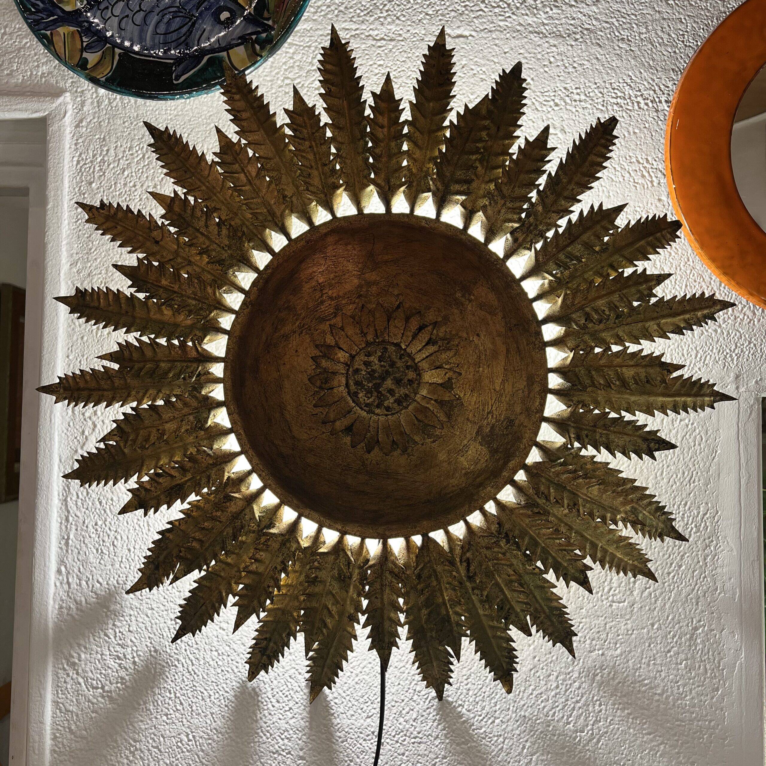 Large wall sconce "Sol" in gilded wrought iron – Spain, 1950s