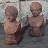Pair of cast iron fireplace chenets "Children"