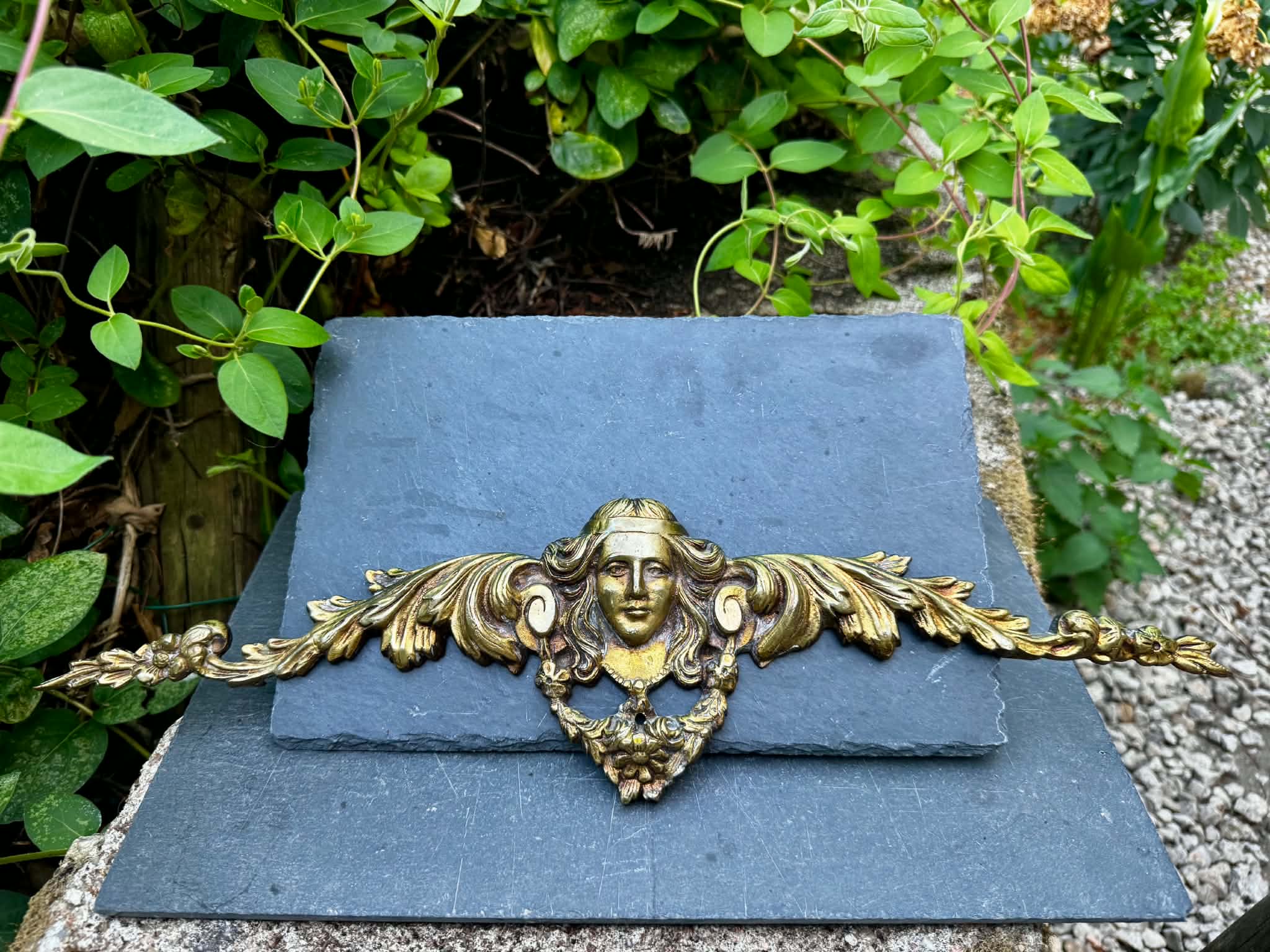 Large bronze fronton with Art Nouveau caryatids.