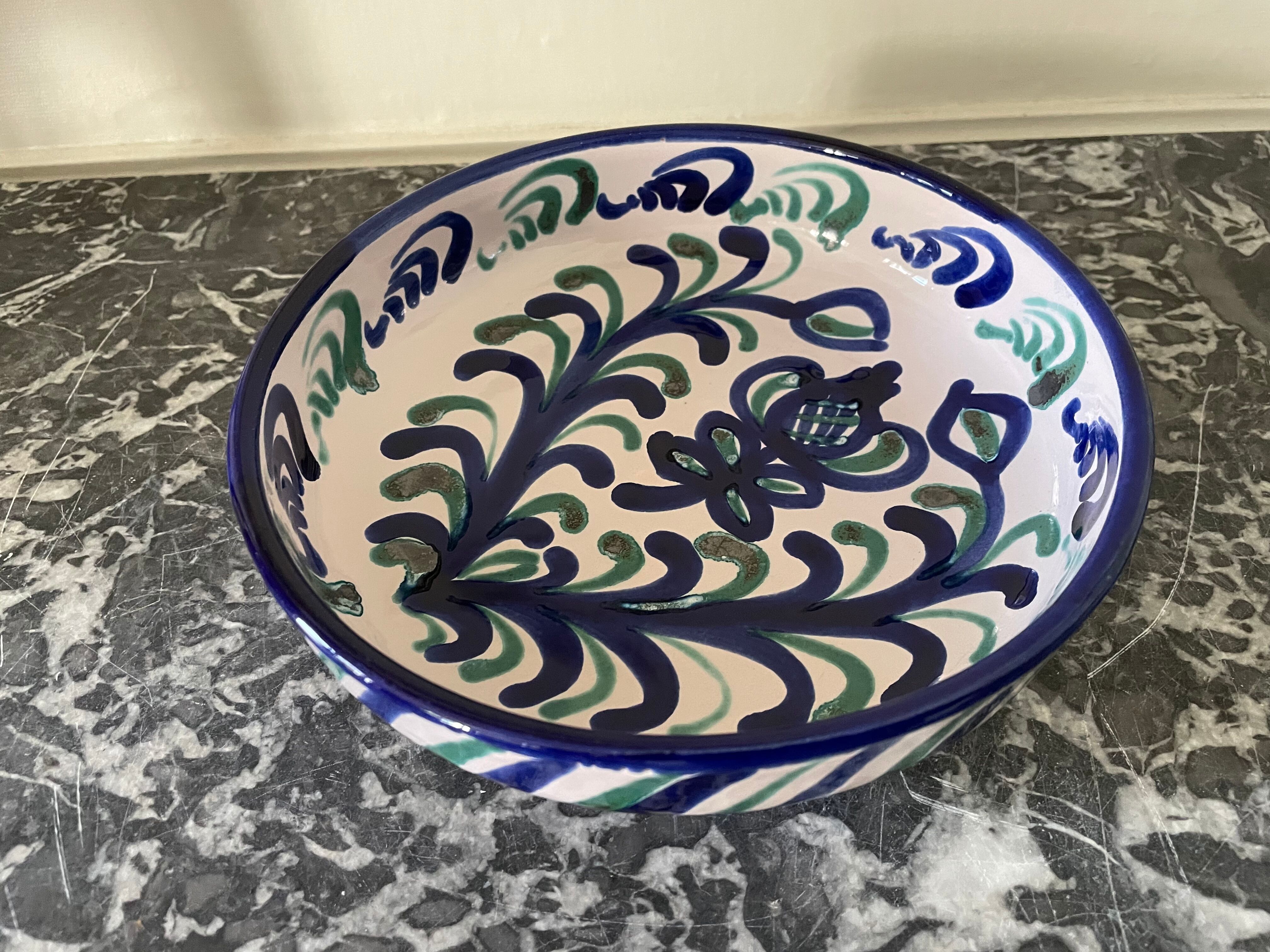 Hollow plate in ceramic from Granada.