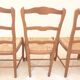 8 Straw chairs with high backs in solid wood