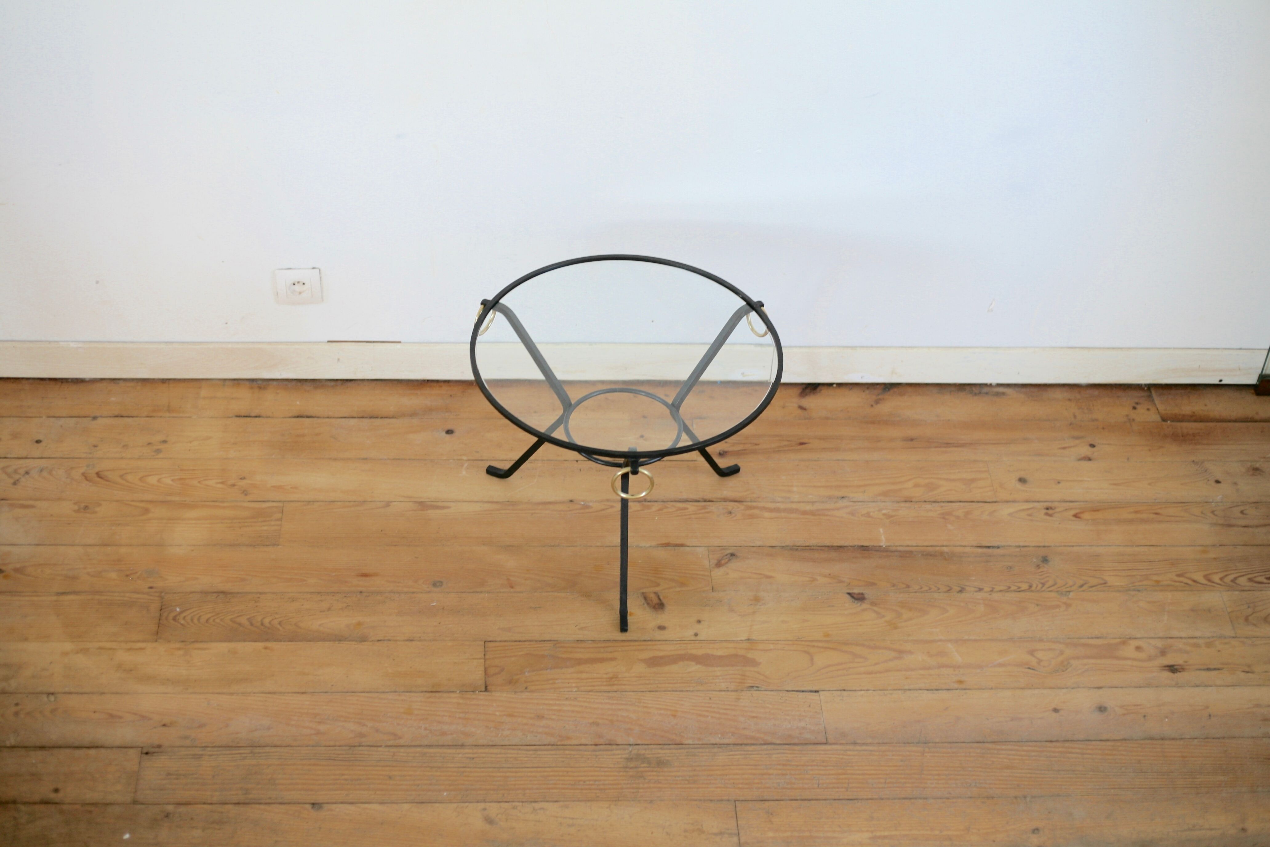 Coffee table black lacquered metal, glass and brass, France, circa 1950.