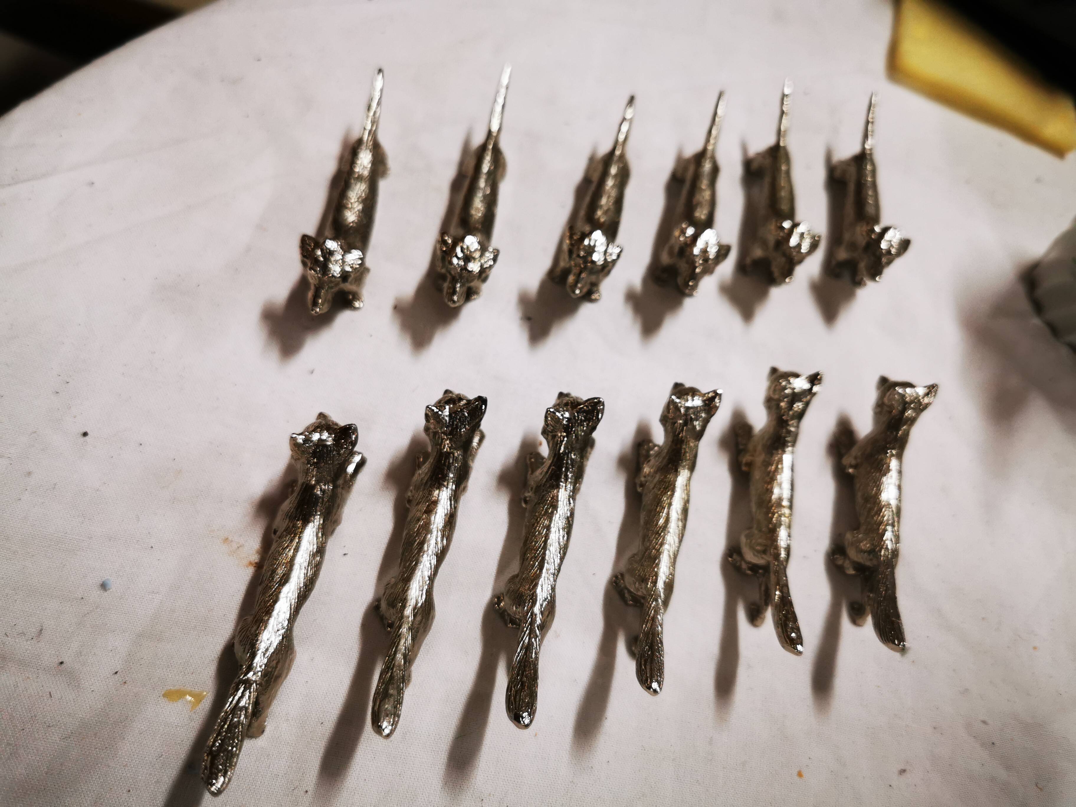 Silver metal hillside holder/rest for 6 Dachshund dogs and 6 Foxes