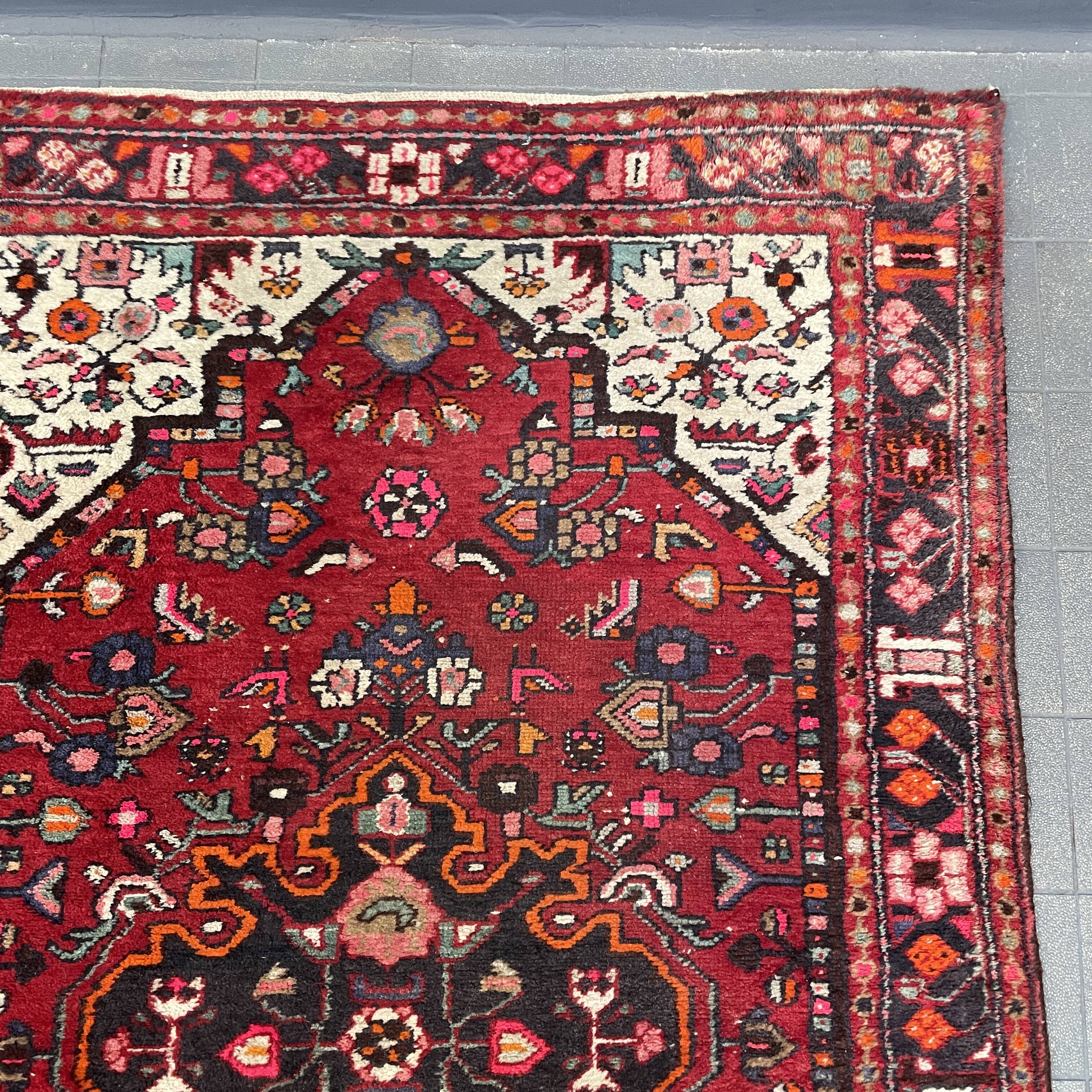 Worn vintage oriental rug or carpet
