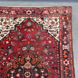 Tapis oriental vintage usé