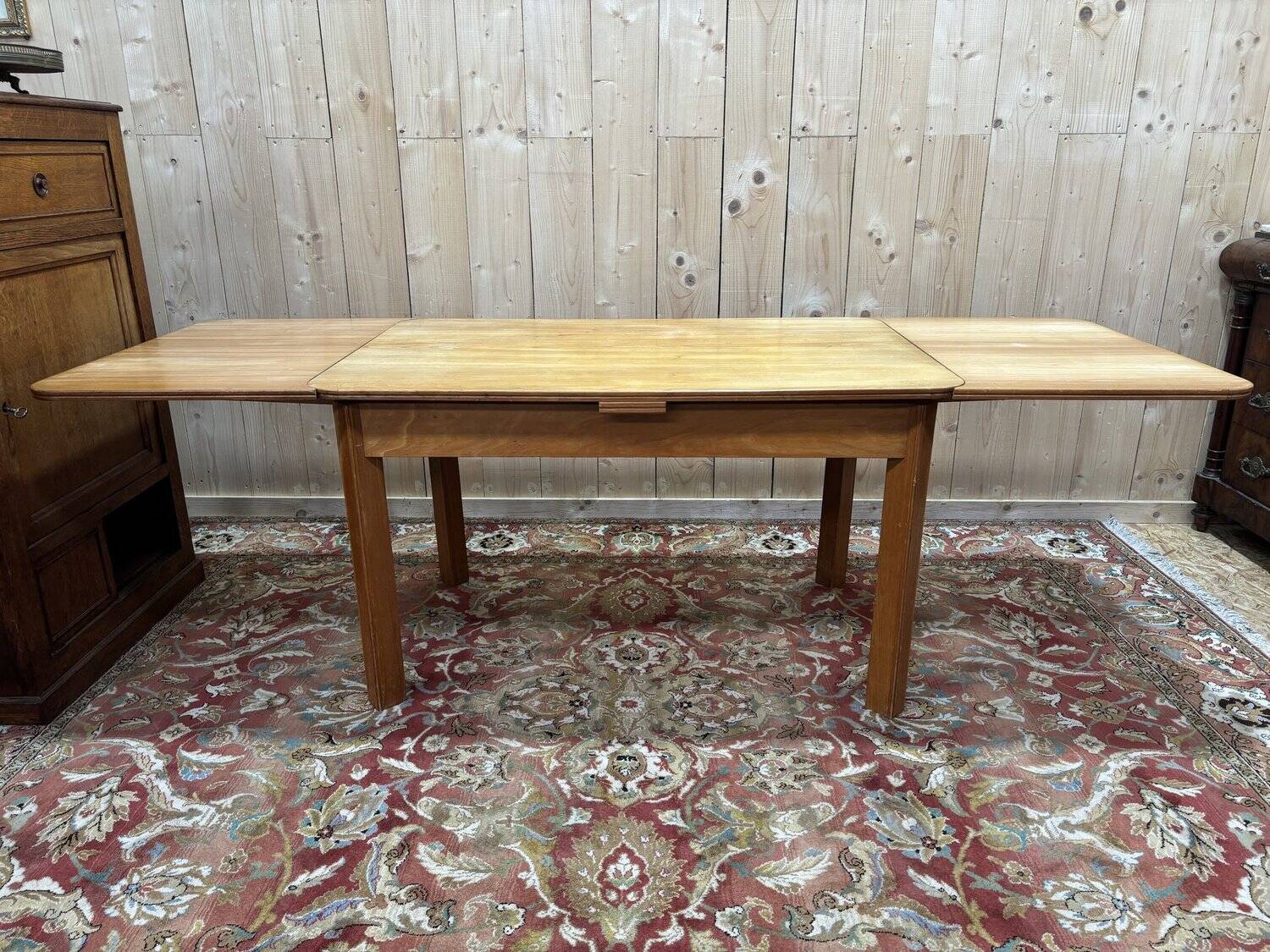Table with extensions from the 1950s in elm.