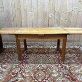 Table with extensions from the 1950s in elm.