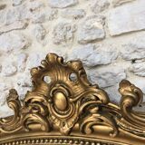 Old mirror 139cm/ 91cm Louis-Philippe with pediment period early 19th, presence of gold leaf.