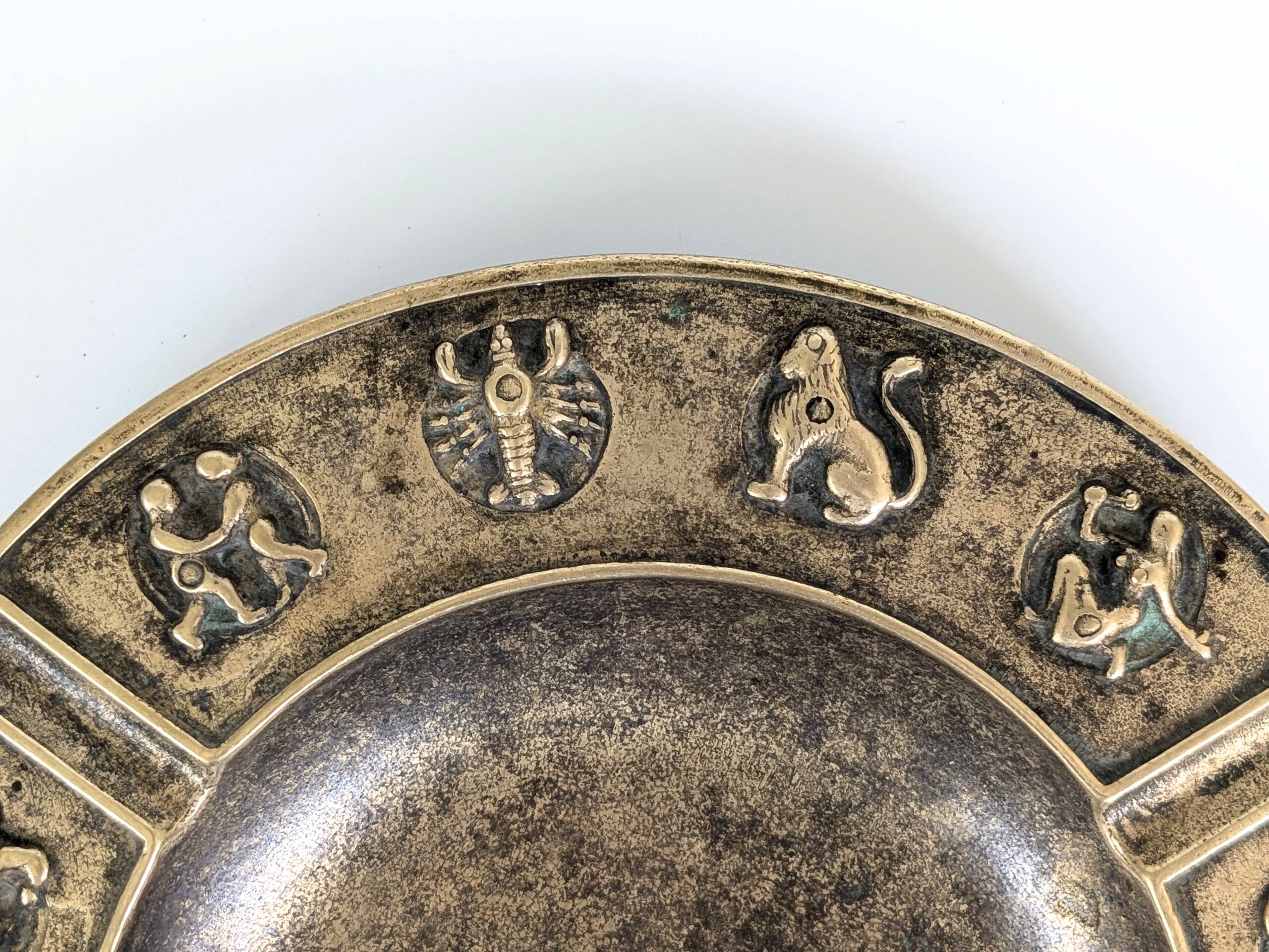 Large brass pocket emptier | Zodiac signs