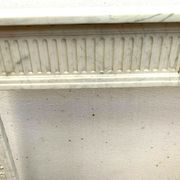 Louis XVI fireplace in 19th century white Carrara marble