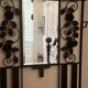 Art deco wrought iron coat rack and Degue lamp