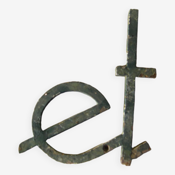 Letter "ET" in steel