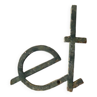Letter "ET" in steel