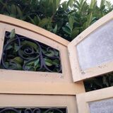 Porte d'entrée cintrée double en chêne, grilles et verre, XIXème