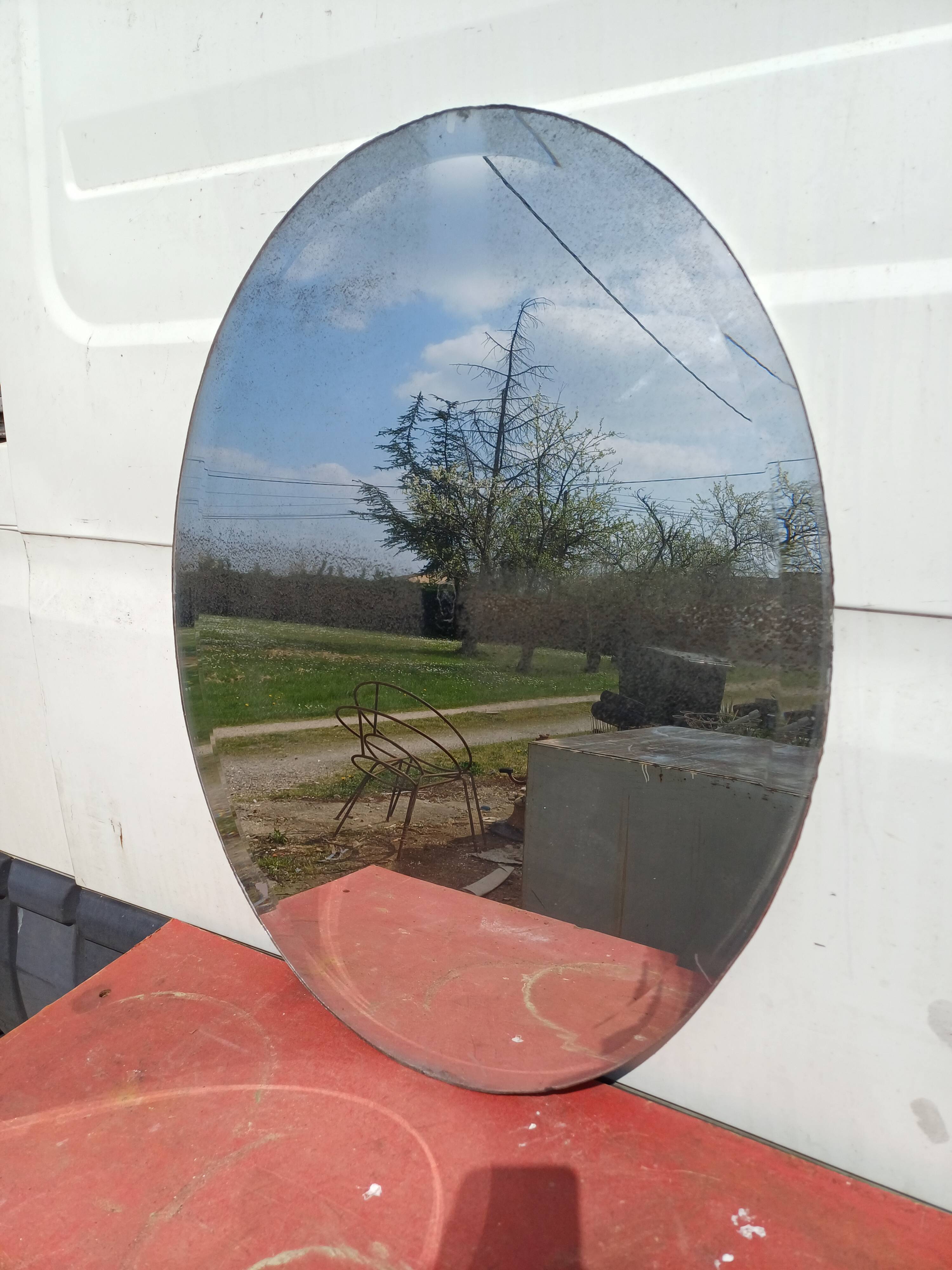 19th century oval beveled mirror