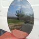 19th century oval beveled mirror