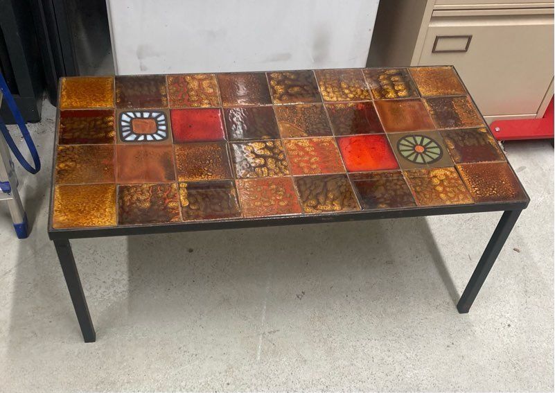 Vintage coffee table in ceramic with wrought iron structure from the 1970s.