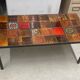 Vintage coffee table in ceramic with wrought iron structure from the 1970s.