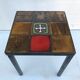 Old black metal and majolica tiles table