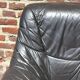 Pair of patinated leather club armchairs