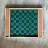 Old game of checkers and small horses