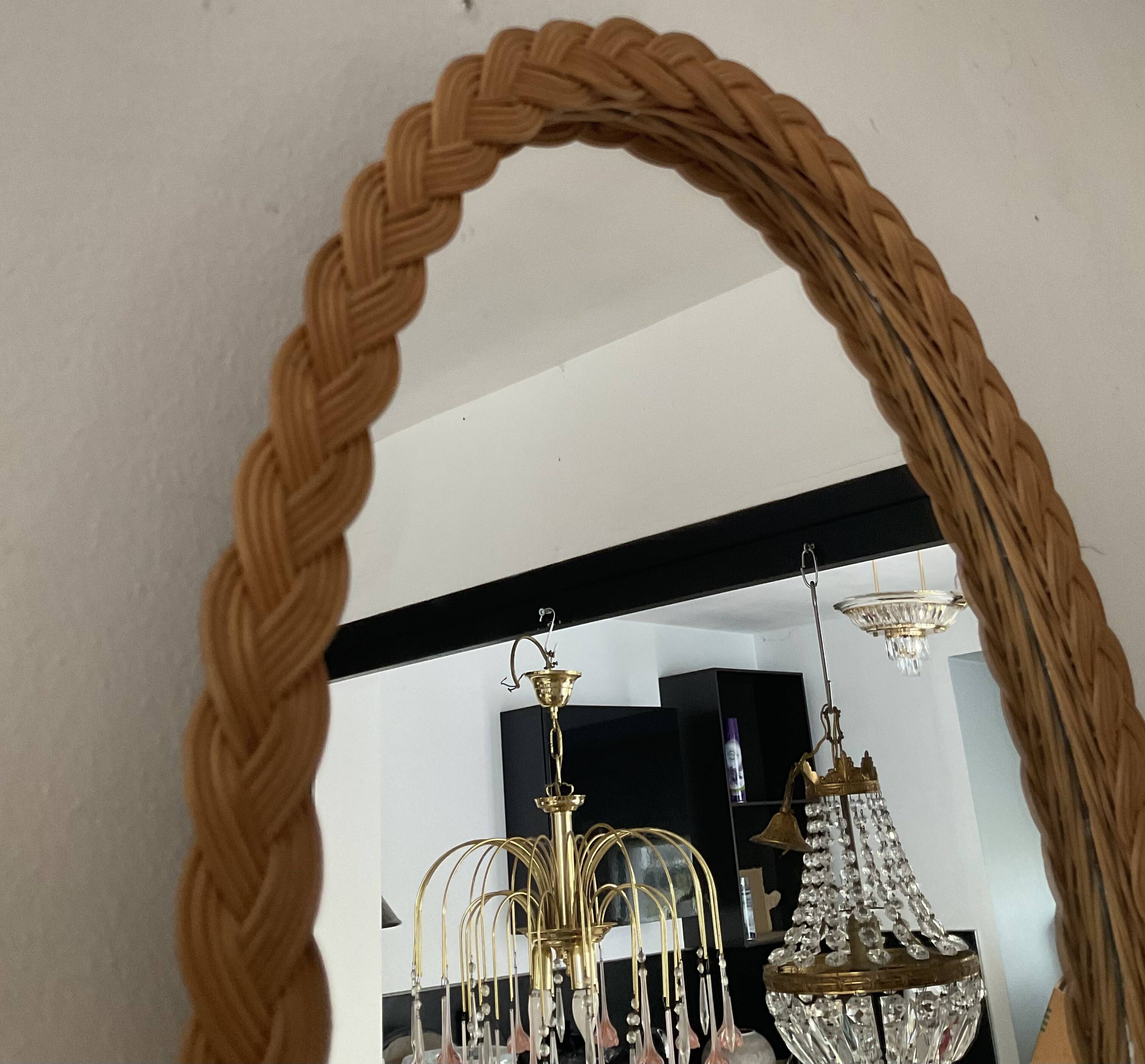 Vintage oval rattan mirror