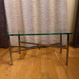 Small chrome and glass coffee table.