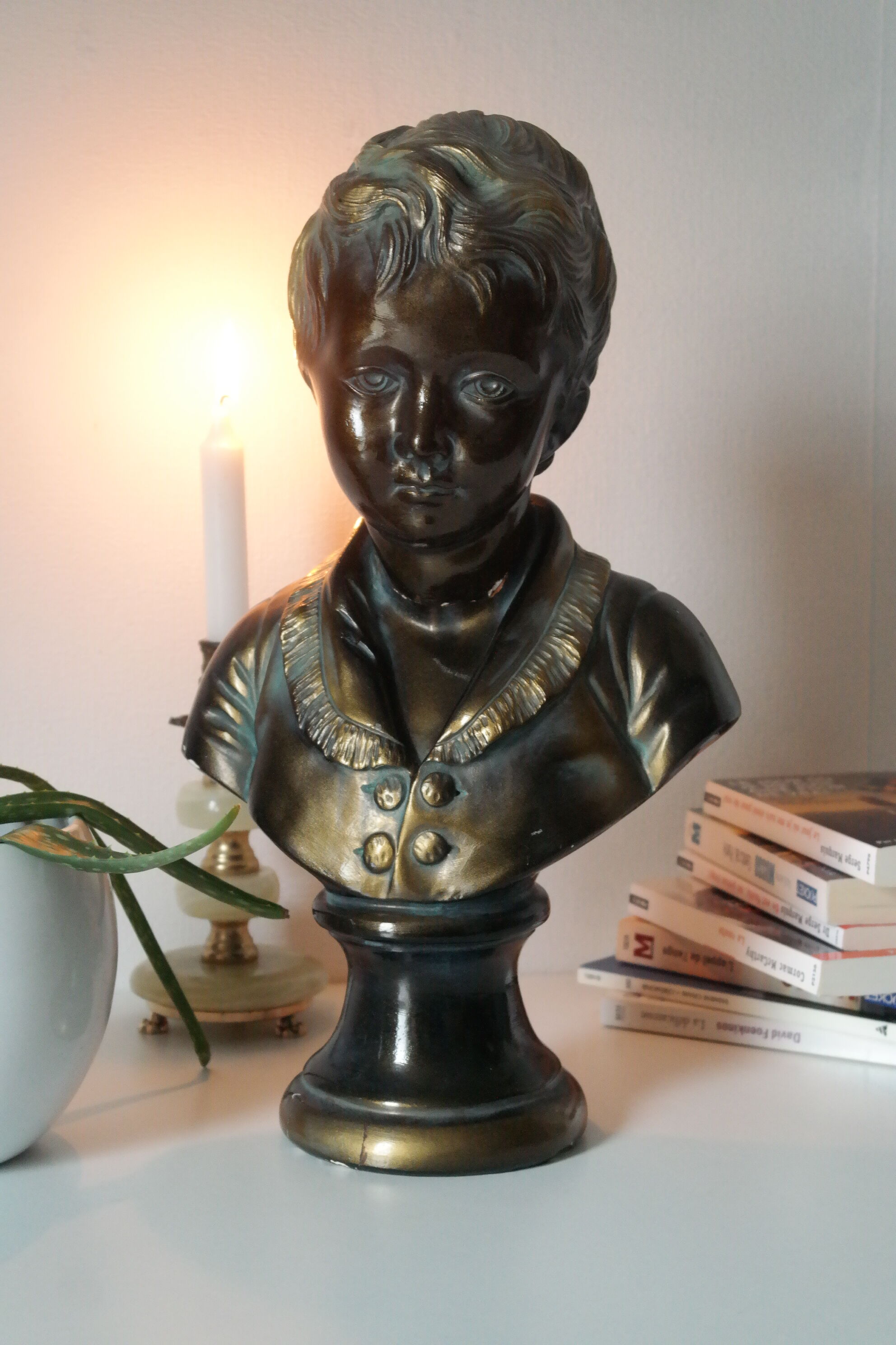 Buste en plâtre garçon patine bronze XXème