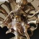 Paire de chandeliers antiques à 3 feux de lumières puttis/angelots bronze