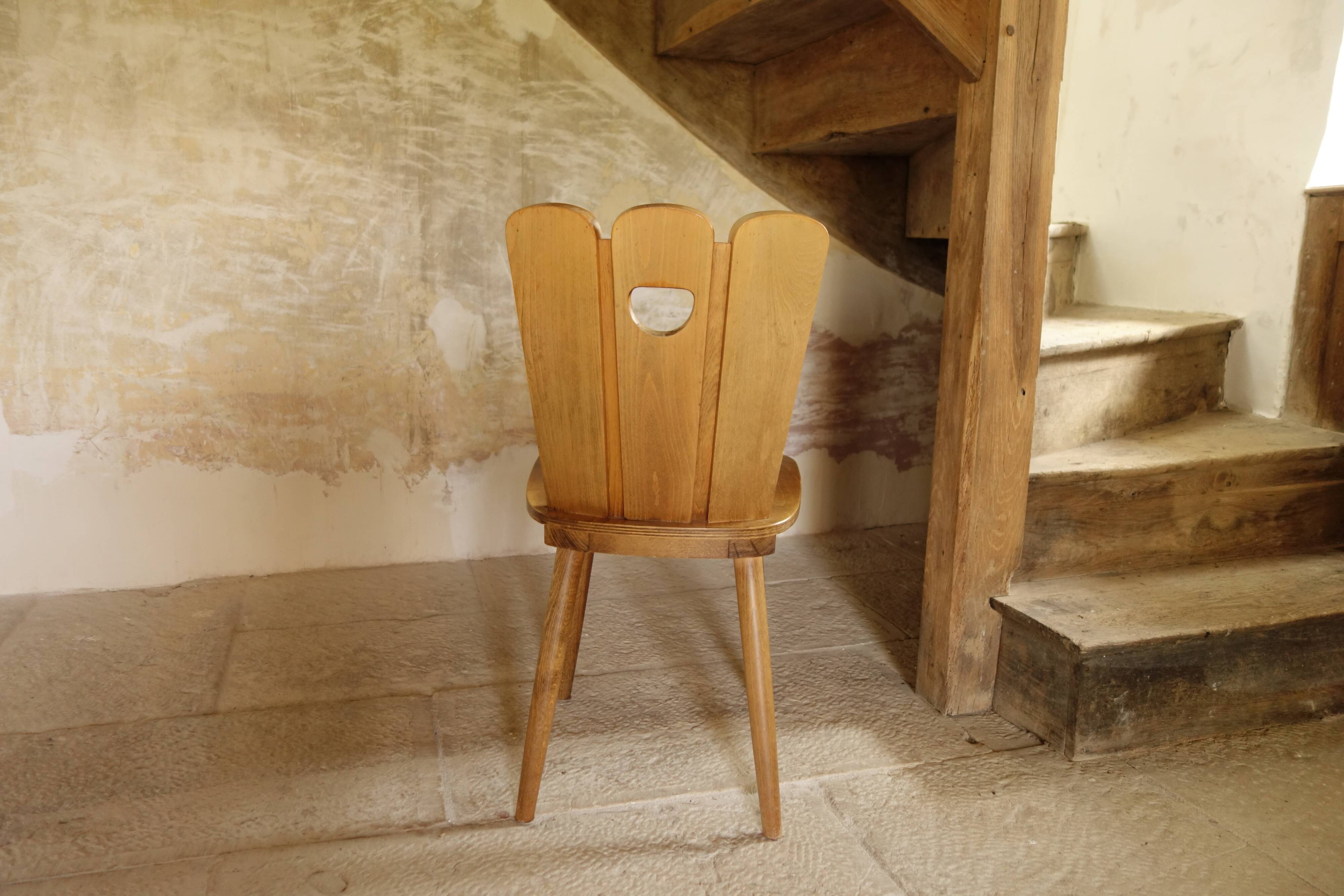 Scandinavian midcentury wooden chairs.