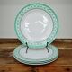 Set of 4 KIFO L'Amandinoise flat plates with green leaf design.
