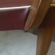 Skai chair binds wine and wooden footpieces and armrests