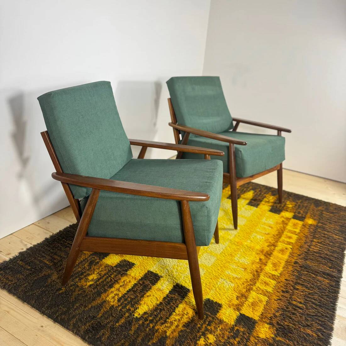 Pair of teak armchairs with green cushions – vintage Scandinavian design