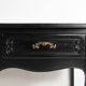 Buffet bas noir de style Louis XV du 20ème siècle.