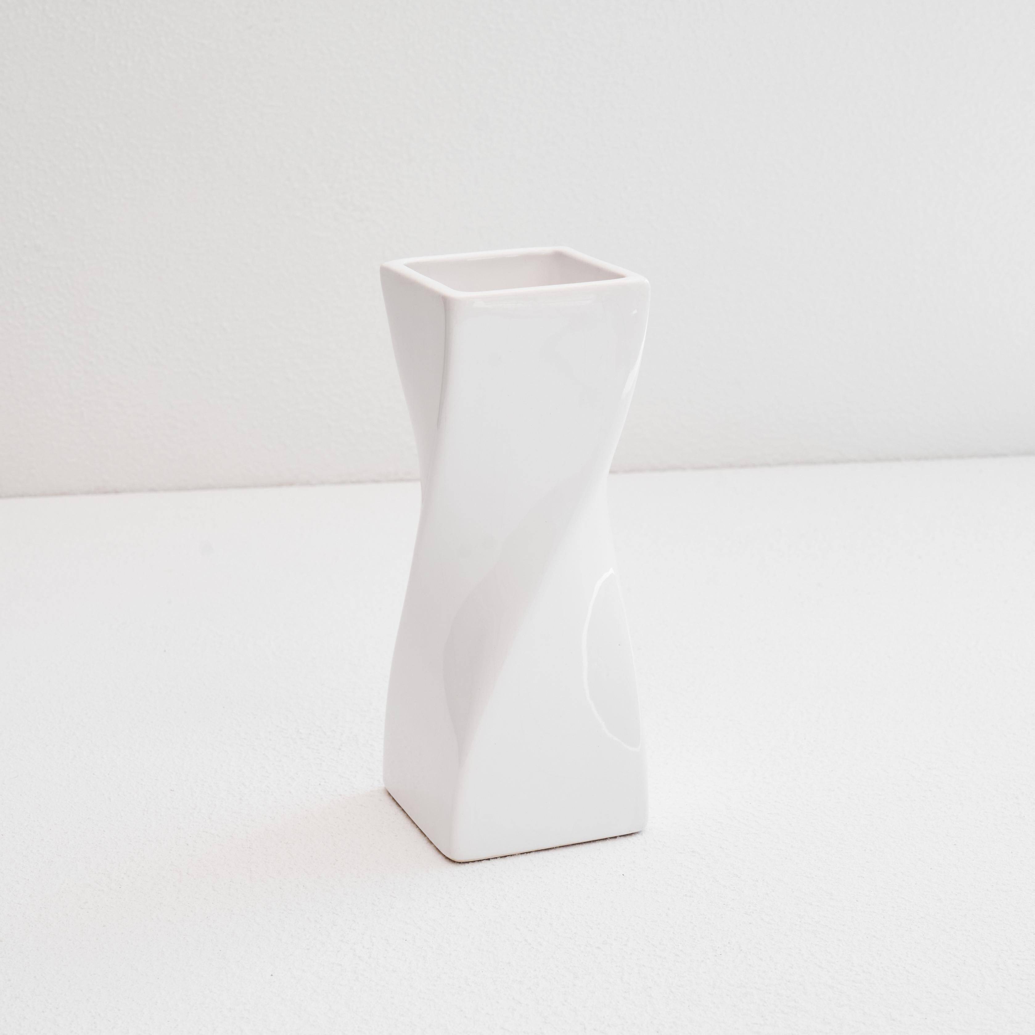Twisted vase in glazed ceramic from the 1980s.
